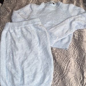 Matching furry sweater crop top and mini skirt